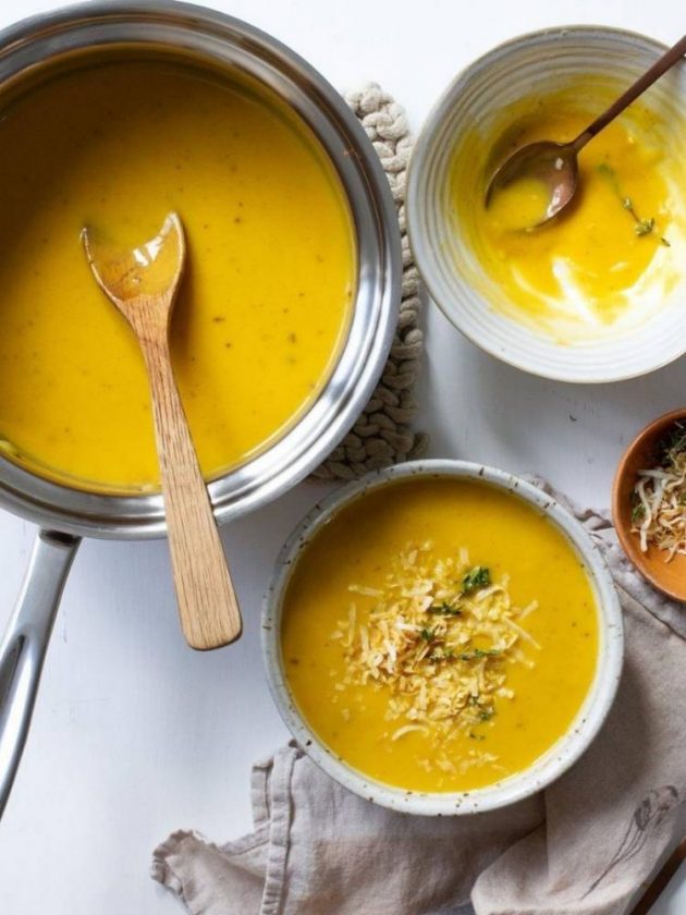 Soup in plates and stainless steel stockpot from 360 Cookware