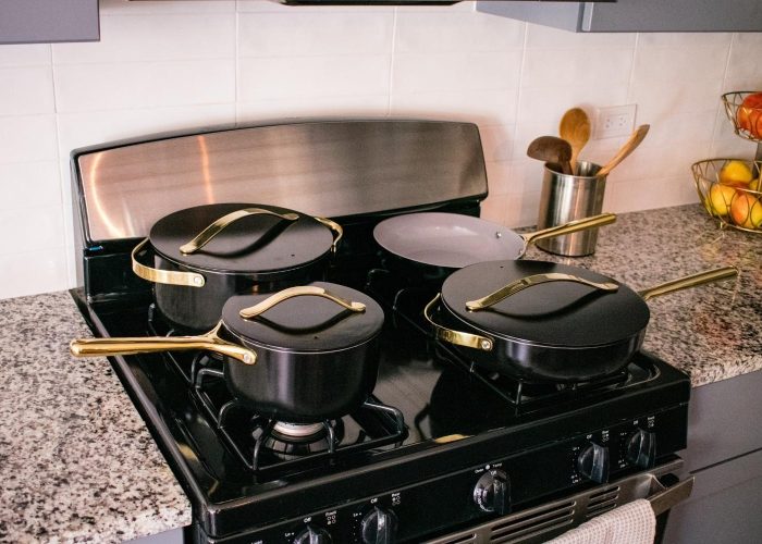 Caraway nontoxic cookware set in black and gold