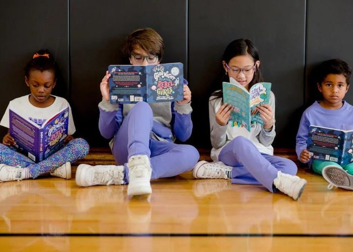 kids reading in sustainable kids clothing