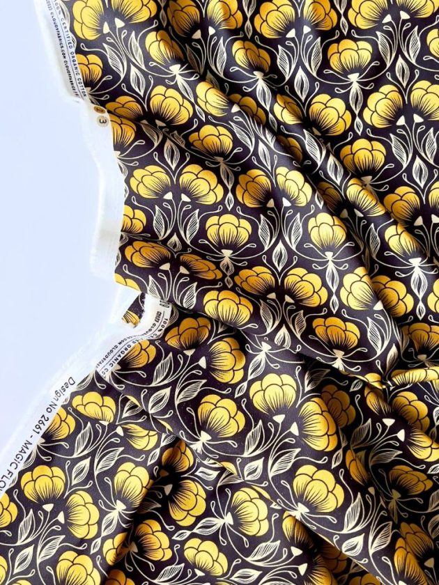 Sustainable black and yellow patterned fabric