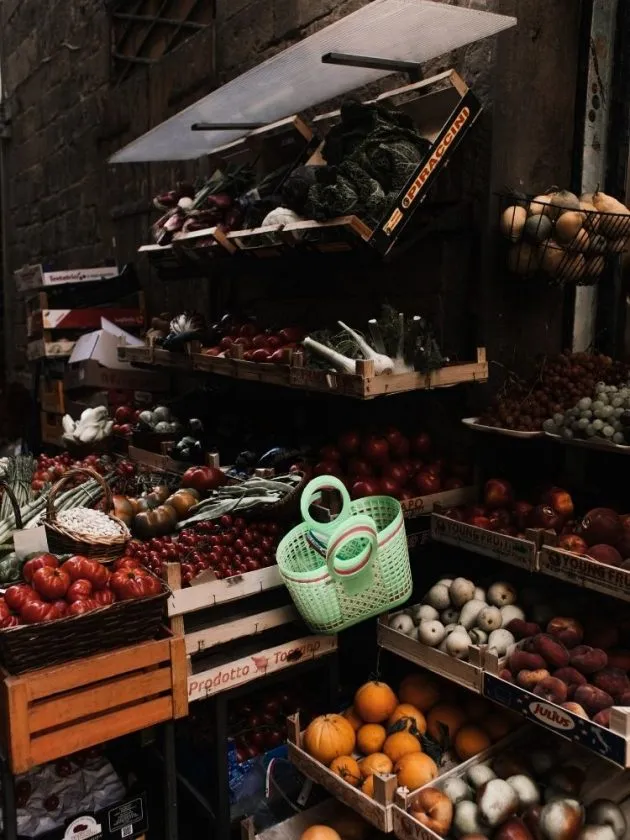 fruits and vegetables in side stall market - responsible tourism tips