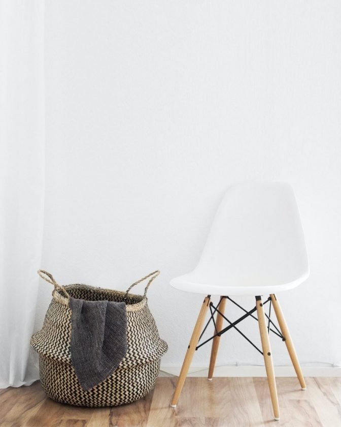 Sustainable chair and basket with a white background