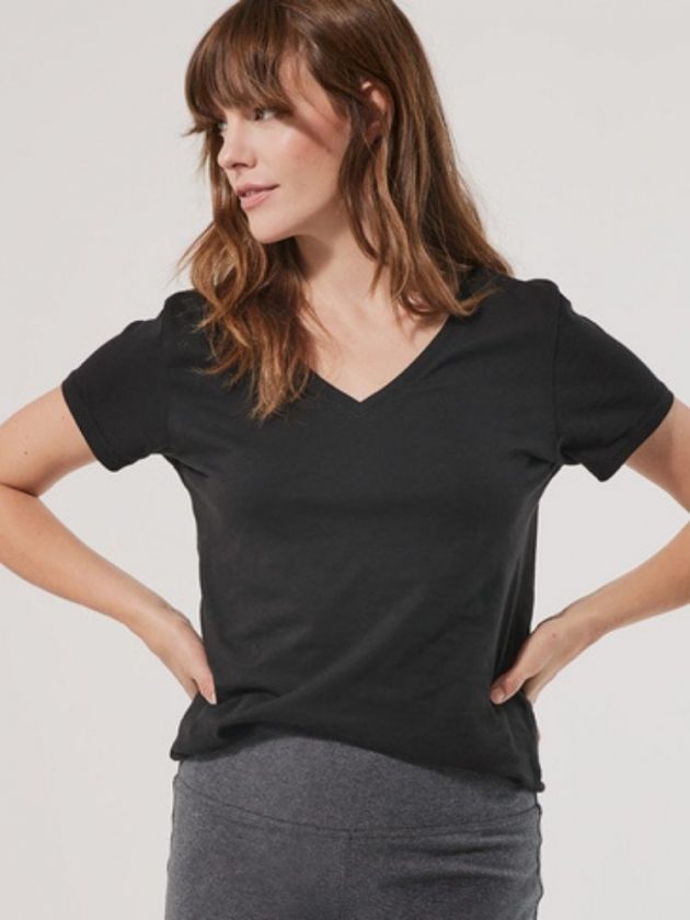 Woman wearing organic black v-neck t-shirt