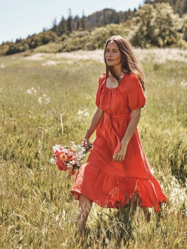 Flowy red-orange sustainable dress from Amour Vert