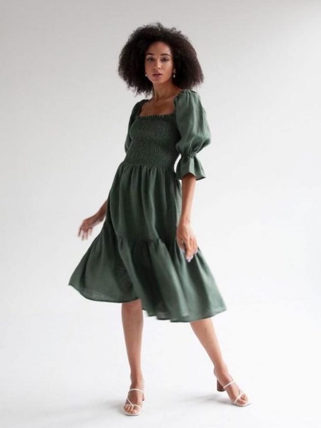 Woman wearing green linen dress 