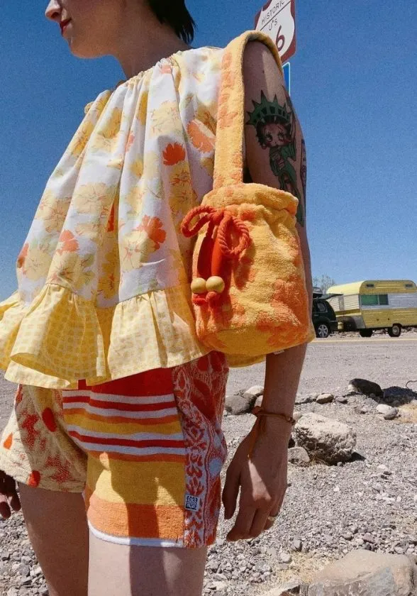 colorful yellow and red shirt, shorts, and bag made from upcycled towels - picnicwear